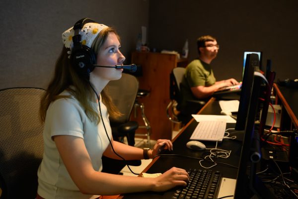 Kenzie James produces a broadcast for HU16 at Harding University in Searcy, Ark.
