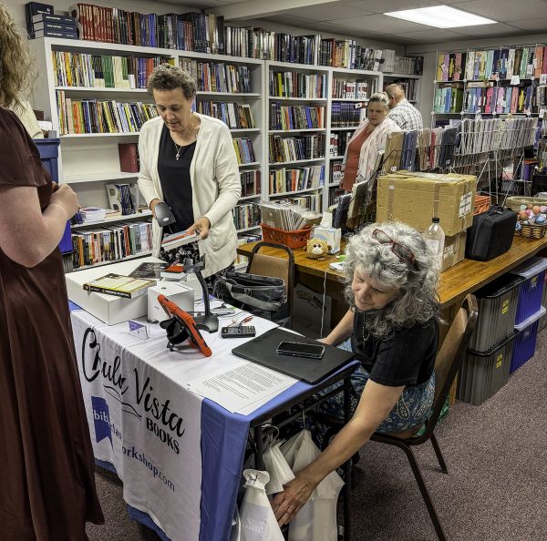 Participants browse through the offerings from Chula Vista Books during the Show Me State Bible Lectures.