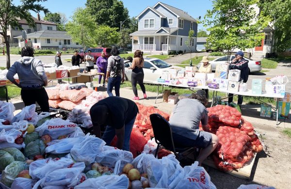 Volunteers prepare food bags for distribution at the Minneapolis Central Church of Christ.
