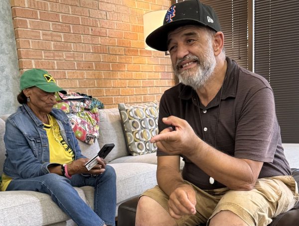 Maurice Costabile visits with a reporter at the Memorial Church of Christ in Houston as Sadie Powell listens.