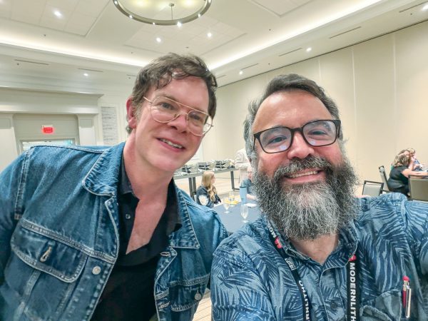 Erik Tryggestad takes a selfie with Christian music singer Jason Gray at the EPA convention.