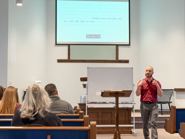 Minister Thomas Wise teaches an adult Bible class at the Cornerstone Church of Christ in Pottstown, Pa.