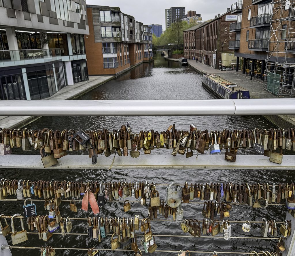 Locks adorn a bridge over one of the many canals in Birmingham, England.