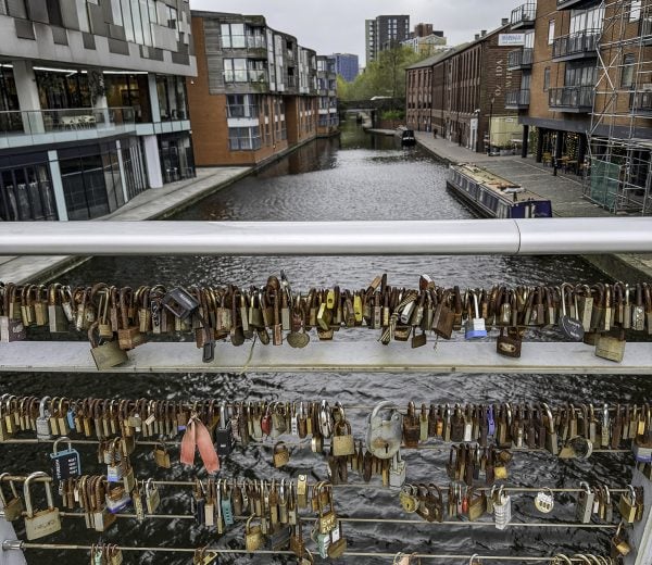Locks adorn a bridge over one of the many canals in Birmingham, England.